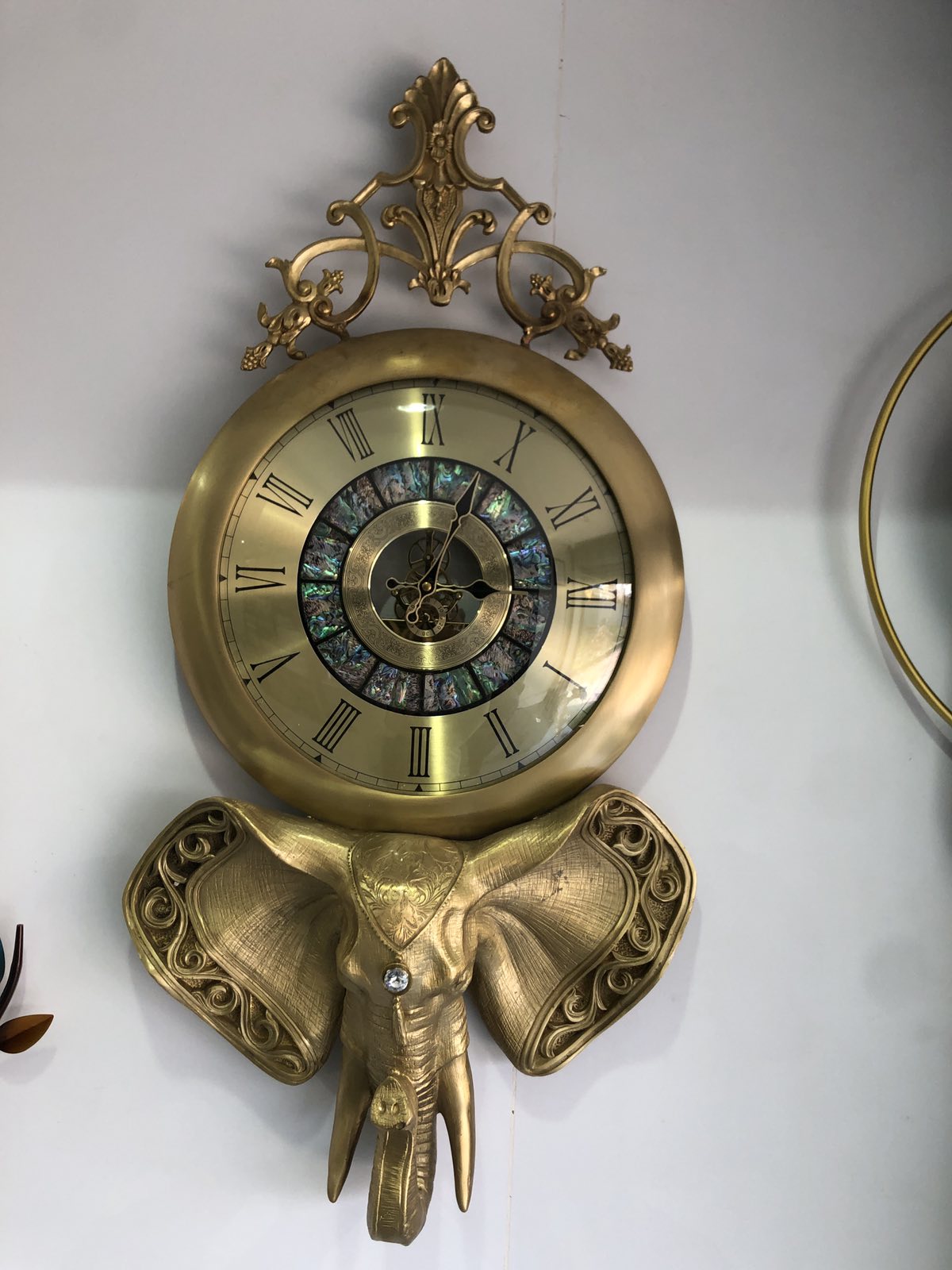 Golden Elephant Wall Clock With Roman Numeral Design