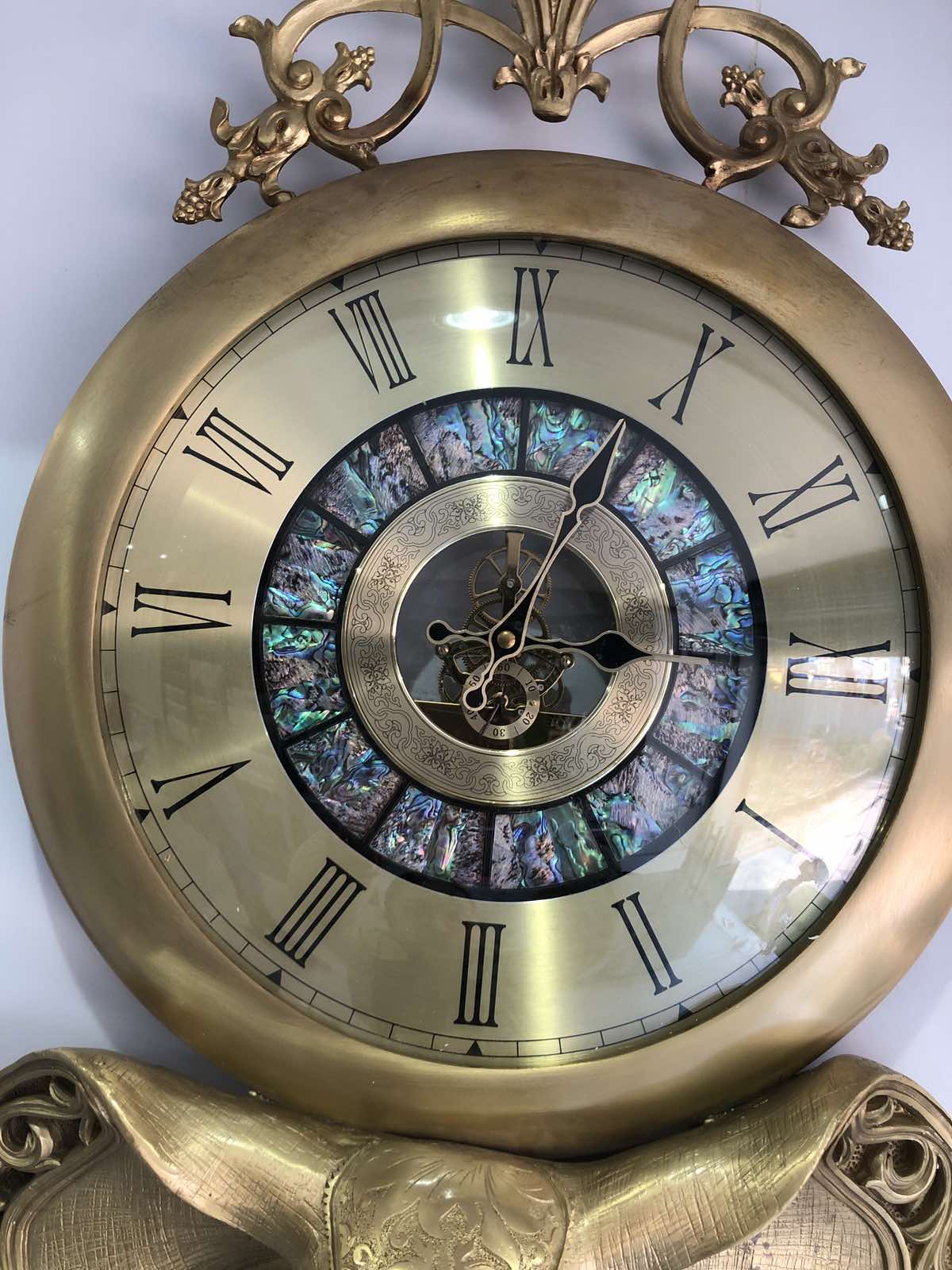 Golden Elephant Wall Clock With Roman Numeral Design