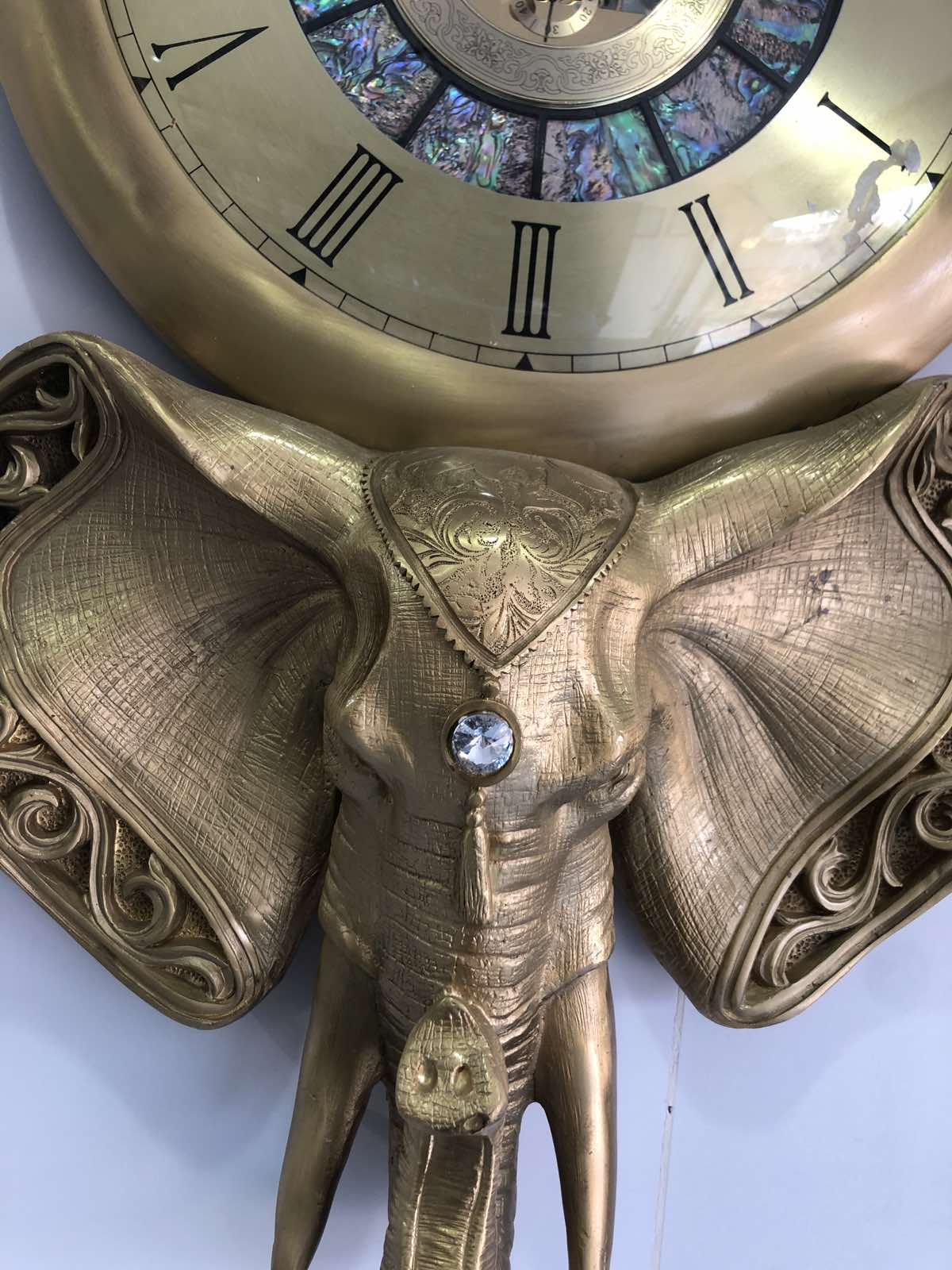 Golden Elephant Wall Clock With Roman Numeral Design