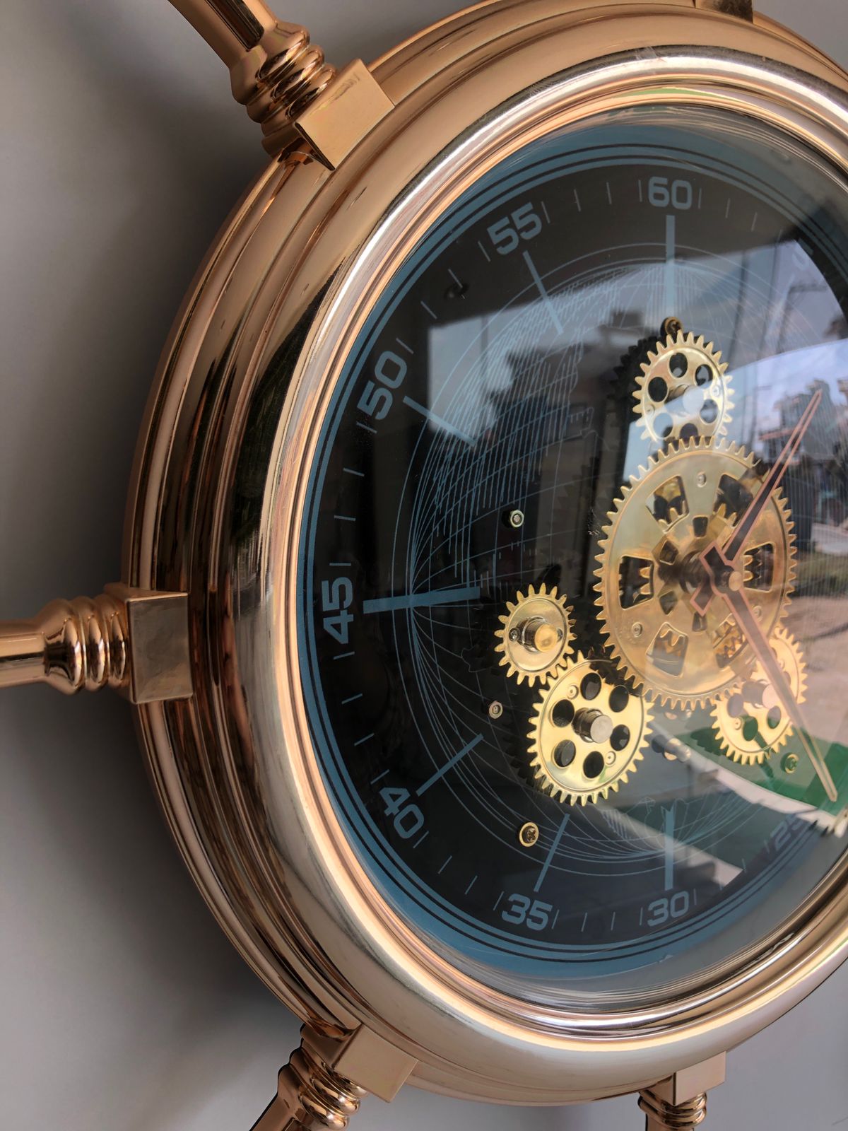 Mechanical Design Resembling A World Map Pattern Wall Clock