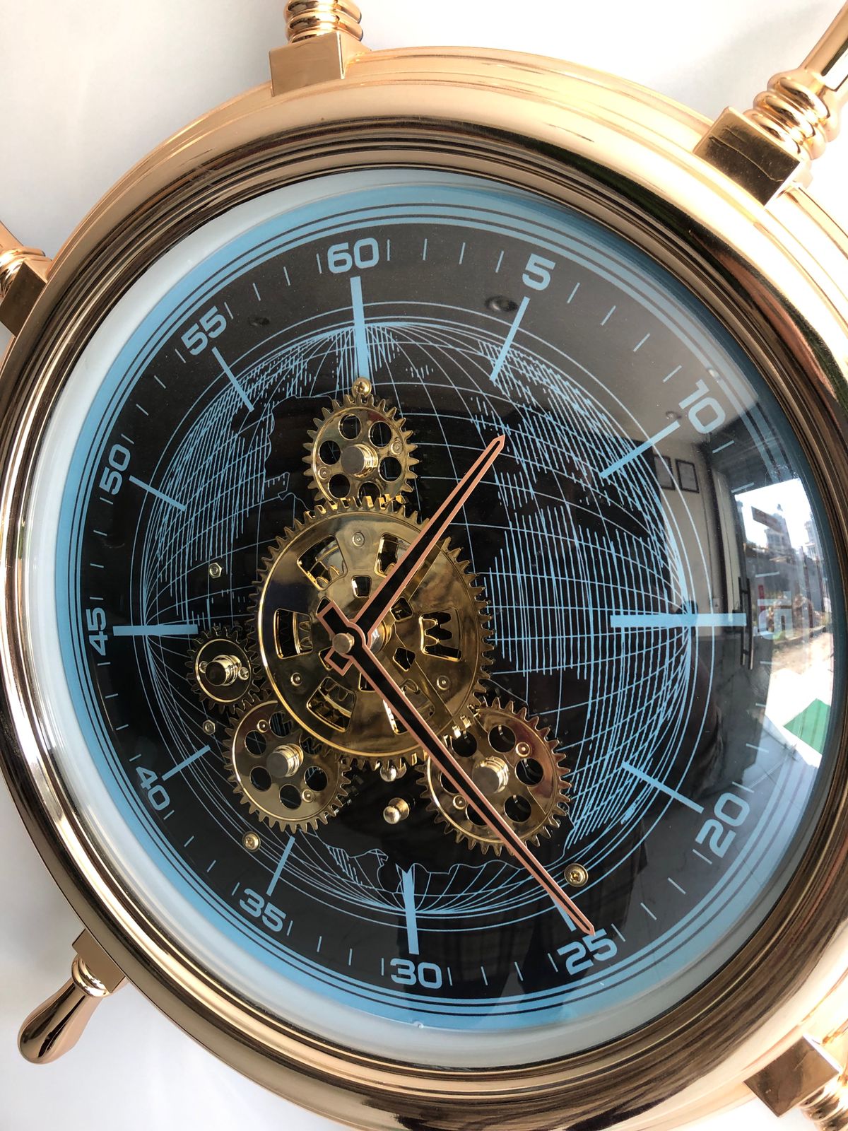 Mechanical Design Resembling A World Map Pattern Wall Clock