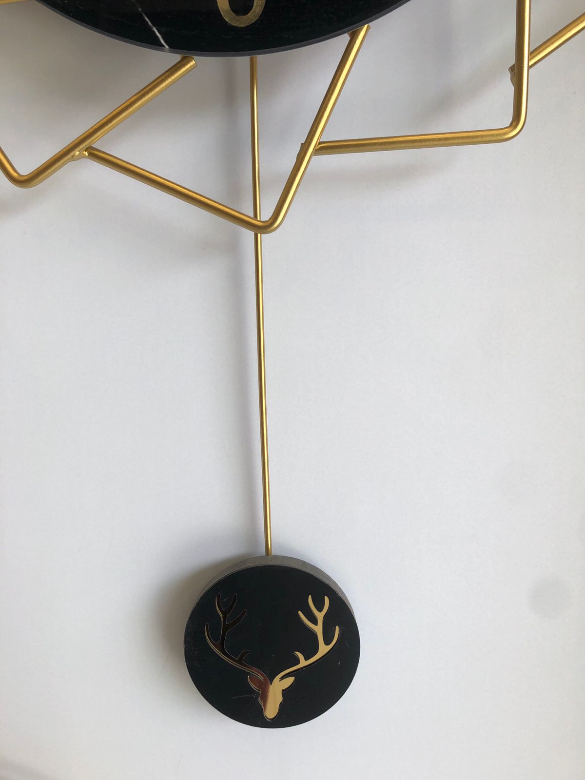Stunning Deer Head Design Black And Gold Pendulum Wall Clock